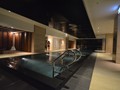 Heated black granite infinity pool in level 9 spa centre, Sauna and Steam Room