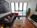 Modern decor, light, quality furniture, wood flooring throughout