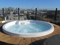 Relax in rooftop hot tubs with fantastic city views, BBQ